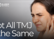 woman holding jaw in pain