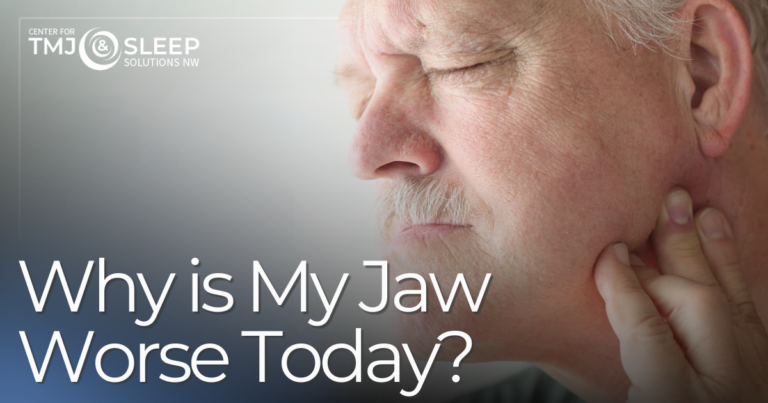 Why is My Jaw Worse Today? man holding jaw in pain