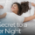 woman stretching in bed